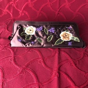 Satin purse with sequin appliqués